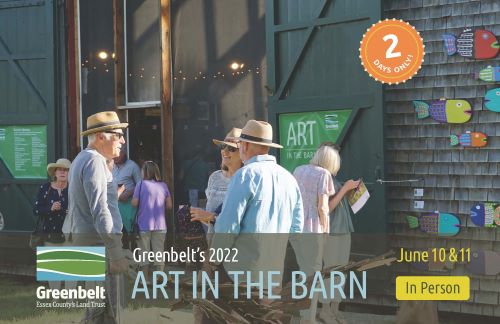 Colorful group of people outside barn at Art in the Barn